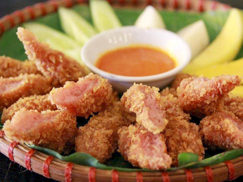 Bite-sized nem chua ran, with a crunchy exterior and a juicy, slightly sour interior